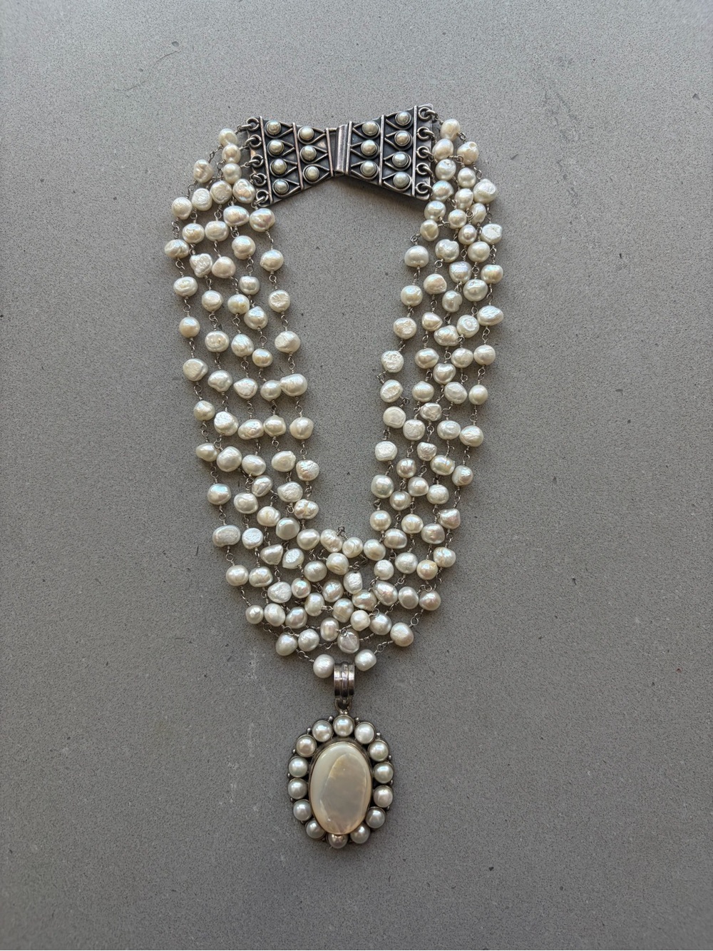 Safia Day Multi-Strand Ivory Pearl Necklace with Oval Pendant